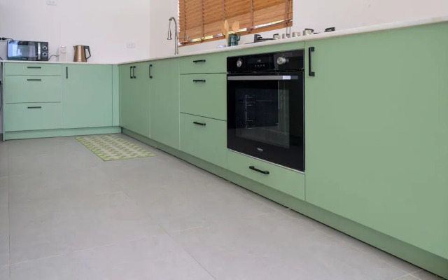 Tropical Poolside Retreat by Sea N' Rent