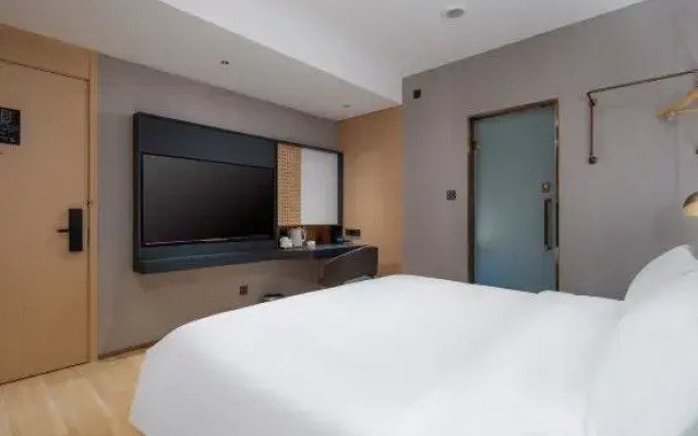 CHEERMAY Hotel (Tunchang Zhengfu Pedestrian Street)