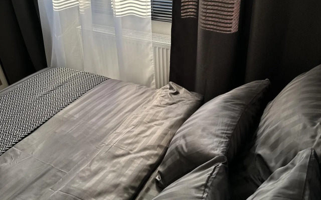 Апартаменты на проспекте Академика Cахарова 27