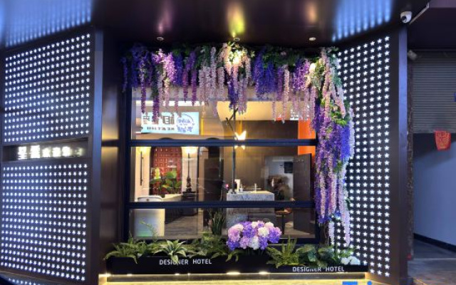 Xinglin Design Hotel (Luliang Jinhui Commercial City)