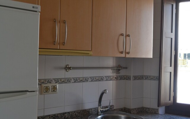 Reservaloen Puerta del Arenal / Topibe SL