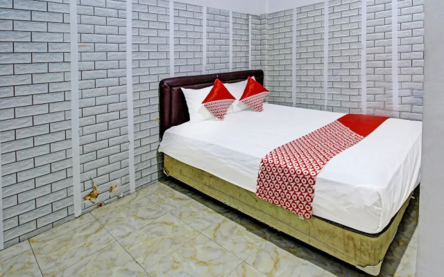 Coupis Guesthouse by OYO Rooms