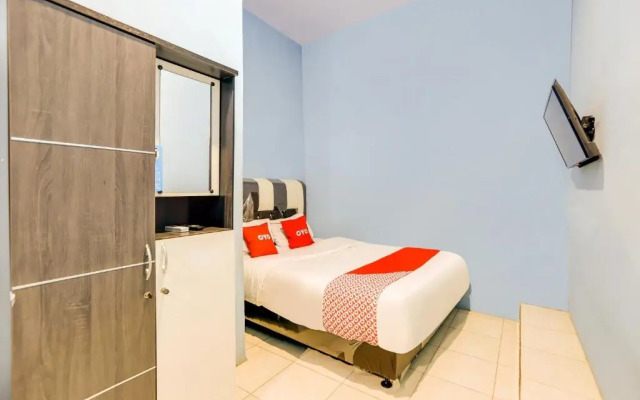 OYO 90009 Faster Inn 1