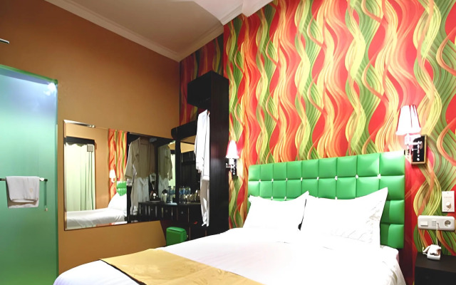 Amos Cozy Hotel & Convention Hall