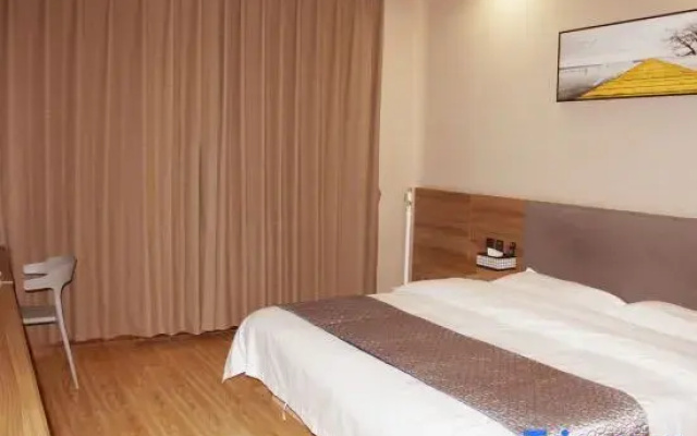 Aishang Hotel (Baoerhan Buddha Tower Dazhao Branch)