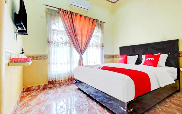 OYO 90307 Fj Alfaeyza Kost