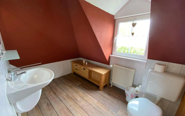 Ferienwohnung im Poolhaus mit Ostseeblick