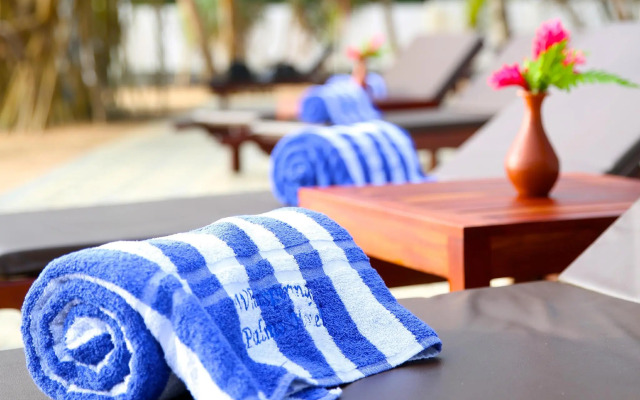 Whispering Palms Hotel