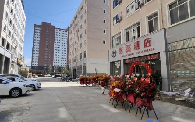 Zhaotong Dongjia Hotel (Jinhai Building Materials City)