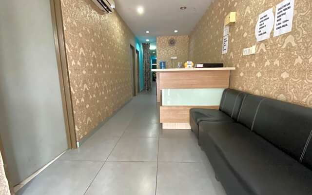 OYO 89760 Harmoni Inn Hotel