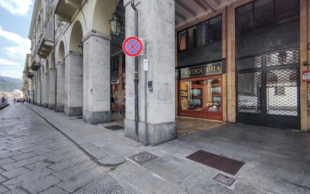 Turin Bed & Books by Wonderful Italy