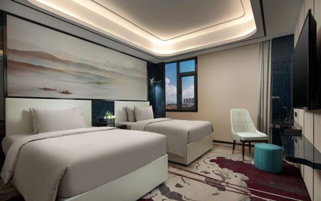 Ramada by Wyndham Mengzi Suites