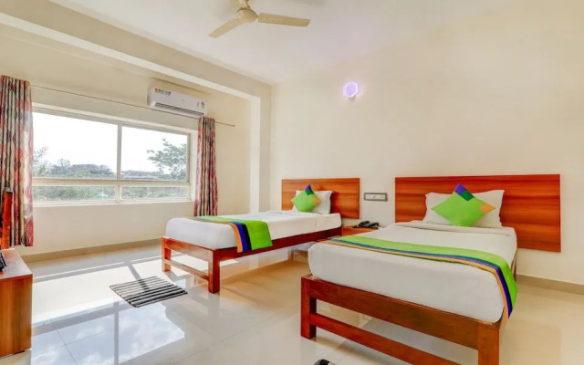 Treebo Atithi Comforts, 1 Km From Nisargadhama Forest