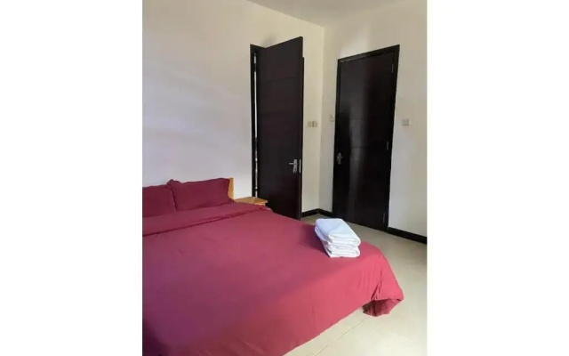 Entire 2 bedroom house with free wifi in Masaki