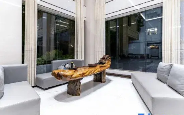 Lijiang Beisili Hotel (Gucheng Zhongyi Market Mufu)