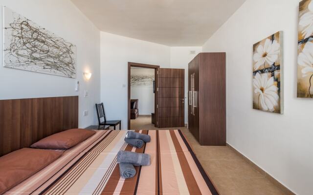 Seashells 2 bedroom Apartment with sunny terrace with stunning panoramic sea views by Getaways Malta