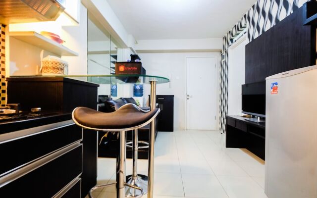 Monochrome Style 2 Bedrooms at Kalibata City Apartment By Travelio
