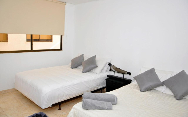 Hotel Axis Inn by Geh Suites