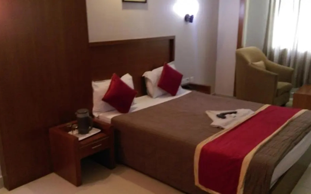 GreenWood Inn & Suites