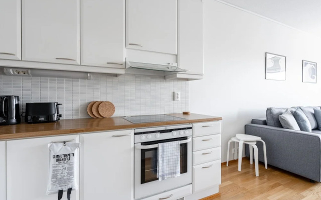 Top Floor 1BR Home with Parking, Sauna and Balcony