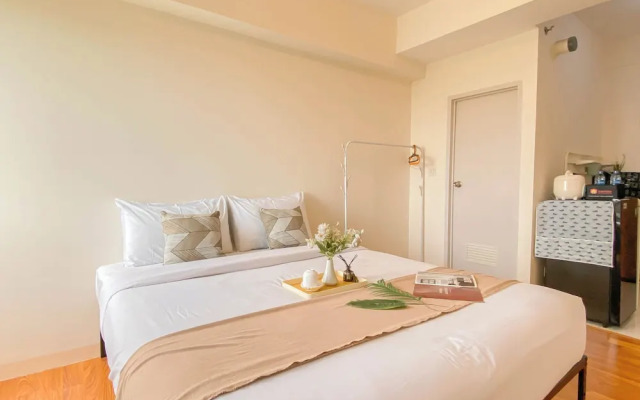 Cozy and Tranquil Studio at Podomoro Golf View Apartment