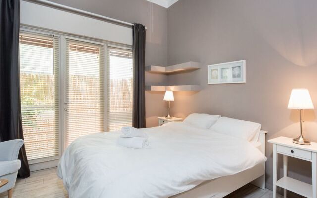 Modern Charm Balcony Retreat by Sea N Rent