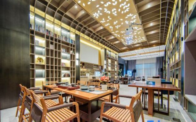 Wutong Apartments Hotel