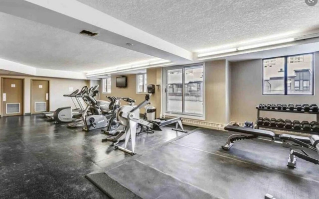 Cozy and Central DT Home w Gym Coffee Parking BBQ