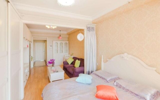 Aiqinhai ApartHotel
