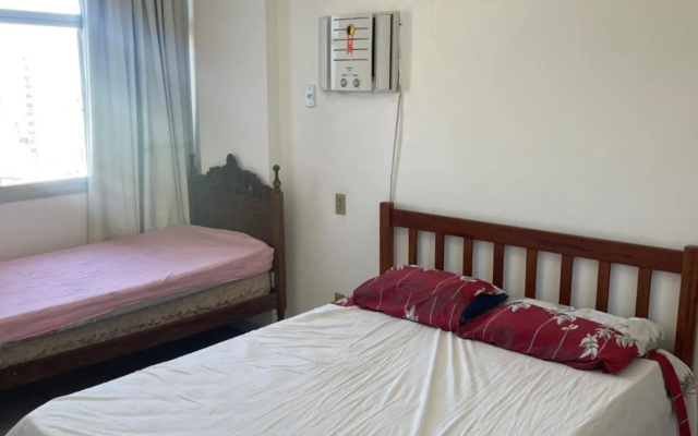 Apartamento Guarapari pé na areia com Wi-Fi e Garagem