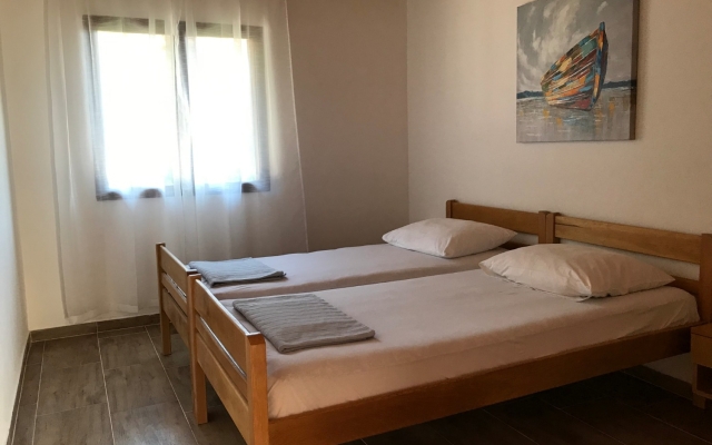 Apartment Petar - 30 m from sandy beach: A1 Nin, Zadar riviera
