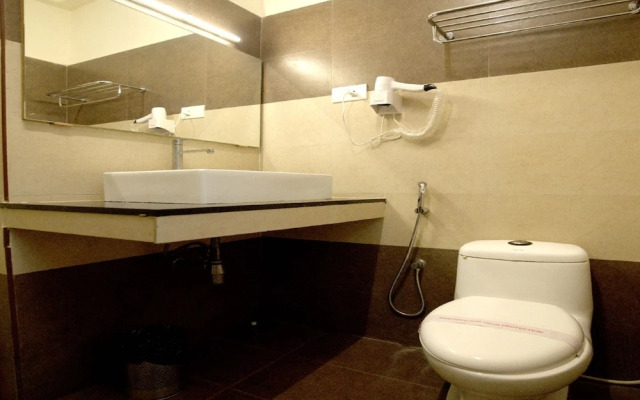 Blossoms Hotel and Service Apartment