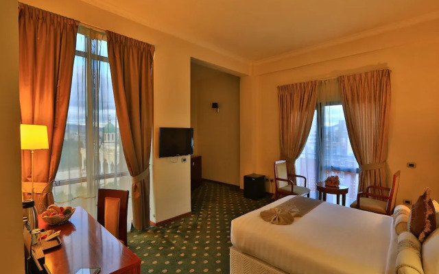 Kenenisa.. Oasis International Hotel