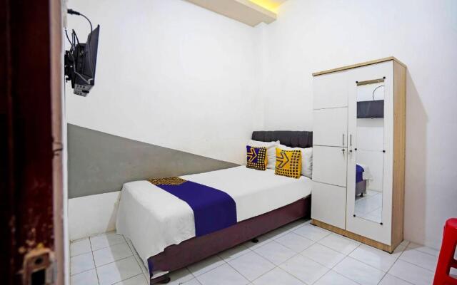 SPOT ON 91360 Swk 68 Syariah