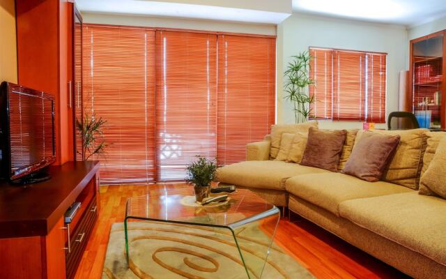 1 Bedroom at Puri Garden Apartment by Travelio