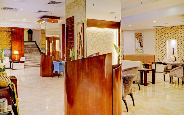 Capital O 596 Garden Palace Hotel