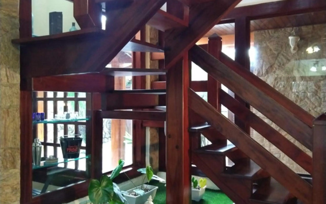 Casa 5 suítes com piscina e churrasqueira