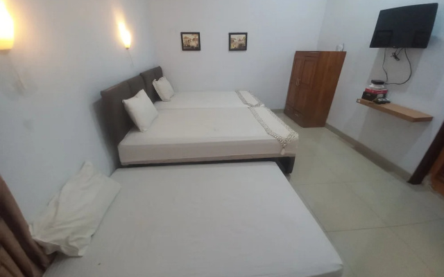 Capital O 93872 Natura Guest House Syariah Near alun alun kota purwokerto