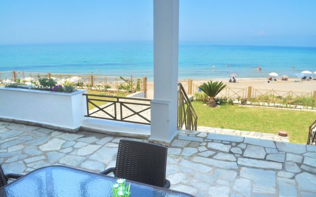 "beachfront 4-bed Luxury Suite - Agios Gordios, Corfu, Greece"