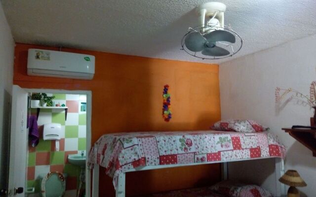 Room in Guest Room - Green Sea Inn in the San Luis Sector