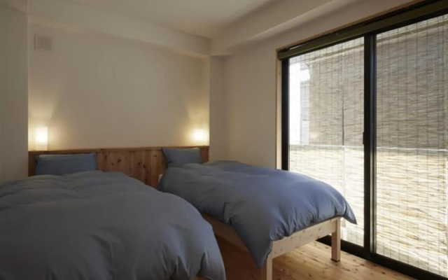 Guesthouse Hyakumanben Cross