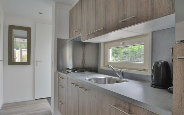 Comfy Chalet With Sunshower, Located in a Forrest