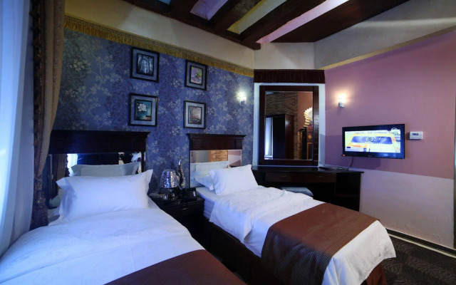 Roomi Suites Hotel