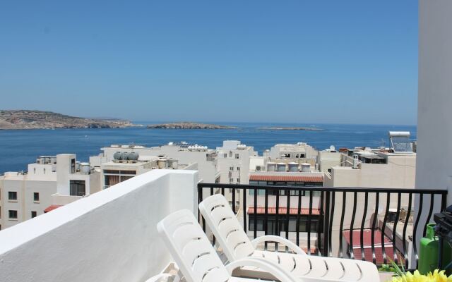 Seashells 2 bedroom Apartment with sunny terrace with stunning panoramic sea views by Getaways Malta