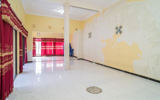 RedDoorz Syariah near Predator Fun Park Batu 2