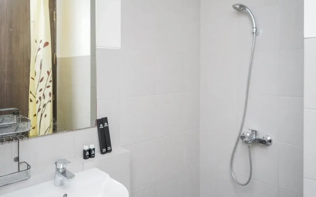 Compact and Monochrome Studio Room Bintaro Icon Apartment