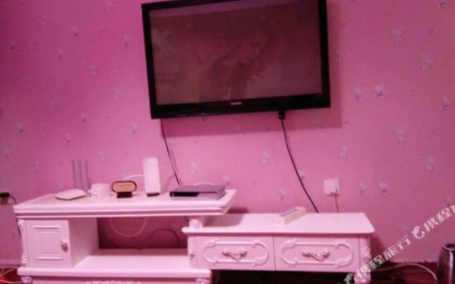 Tangtang Theme Apartment Holiday Hotel