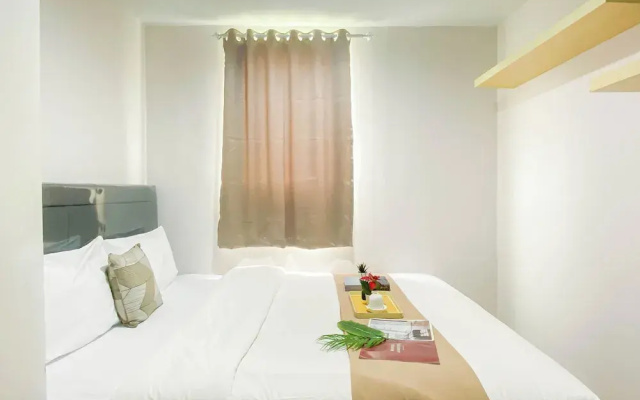 Simple 2Br At Azalea Suites Apartment
