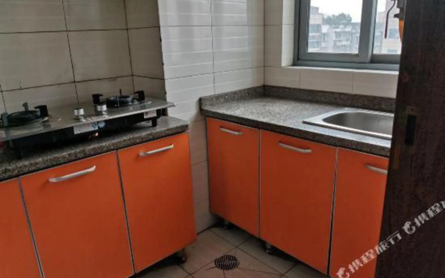 Qingqing Wojia Hotel Style Apartment