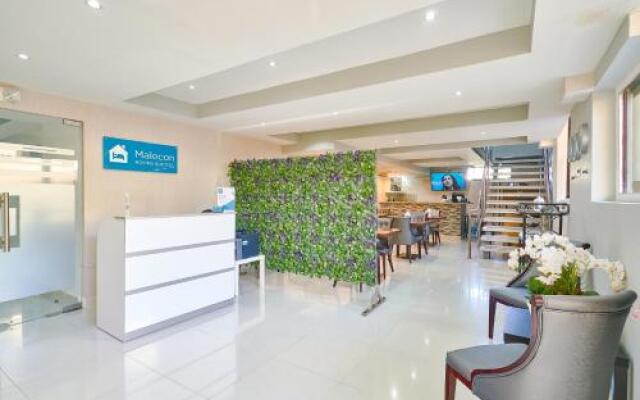 Malecon Rooms y Hotel